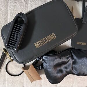 Moschino Black and Gold Wristlet Bag/cosmetic bag